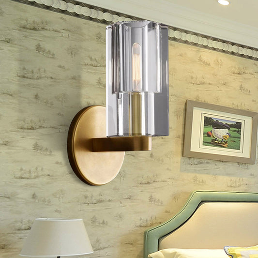 Cylinder Clear Crystal Wall Lamp Modernist 1 Light Wall Lighting Fixture with Round Backplate in Brass Brass Clearhalo 'Modern wall lights' 'Modern' 'Wall Lamps & Sconces' 'Wall Lights' Lighting' 224437