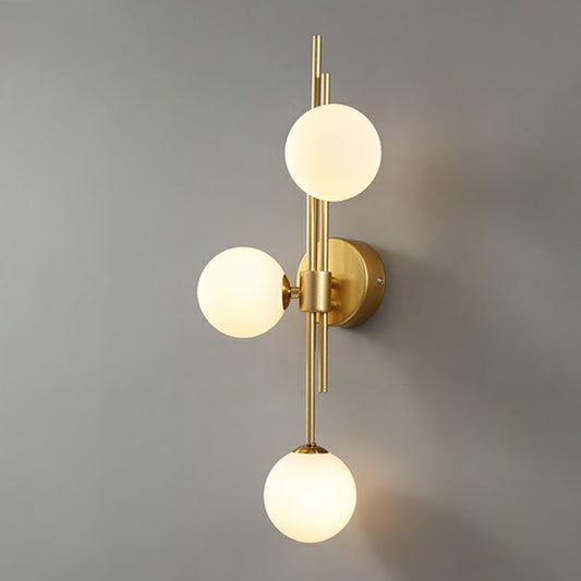 Designer Ball Wall Light Sconce Glass 3-Head Bedroom Wall Mounted Lighting in Brass White Clearhalo 'Cast Iron' 'Glass' 'Industrial' 'Modern wall lights' 'Modern' 'Tiffany' 'Traditional wall lights' 'Wall Lamps & Sconces' 'Wall Lights' Lighting' 2254627