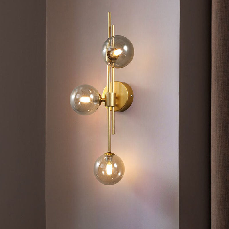 Designer Ball Wall Light Sconce Glass 3-Head Bedroom Wall Mounted Lighting in Brass Clearhalo 'Cast Iron' 'Glass' 'Industrial' 'Modern wall lights' 'Modern' 'Tiffany' 'Traditional wall lights' 'Wall Lamps & Sconces' 'Wall Lights' Lighting' 2254632