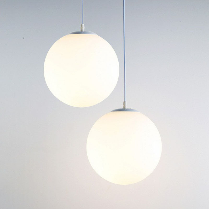 Opaque Glass Spherical Hanging Lamp Modern 1 Head White Pendant Lighting for Dining Room Clearhalo 'Ceiling Lights' 'Modern Pendants' 'Modern' 'Pendant Lights' 'Pendants' Lighting' 2254704