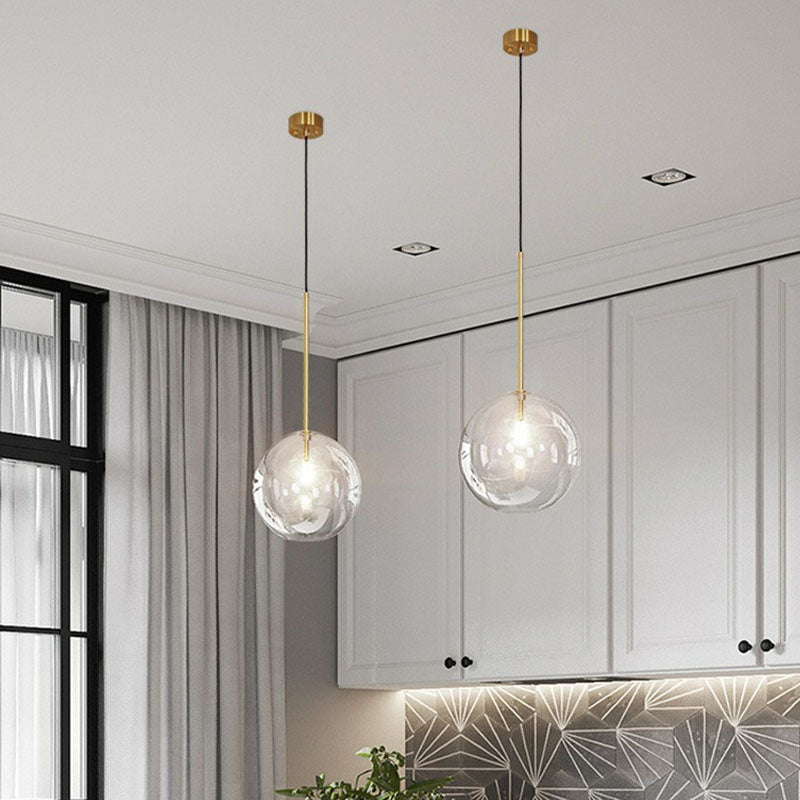 Hand-Blown Glass Globe Hanging Lamp Minimalism 1 Light Gold Finish Ceiling Pendant Clearhalo 'Ceiling Lights' 'Modern Pendants' 'Modern' 'Pendant Lights' 'Pendants' Lighting' 2254725