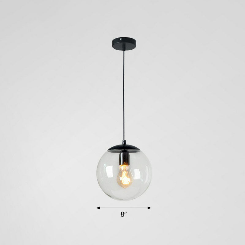 Clear Glass Globe Hanging Light Minimalistic 1-Light Black Pendant Lighting for Restaurant Black 8" B Clearhalo 'Ceiling Lights' 'Modern Pendants' 'Modern' 'Pendant Lights' 'Pendants' Lighting' 2254754