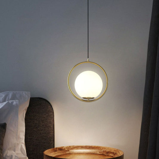 Globe Bedside Pendulum Light Cream Glass 1-Head Postmodern Ceiling Pendant with Ring in Gold Gold Clearhalo 'Ceiling Lights' 'Modern Pendants' 'Modern' 'Pendant Lights' 'Pendants' Lighting' 2254872