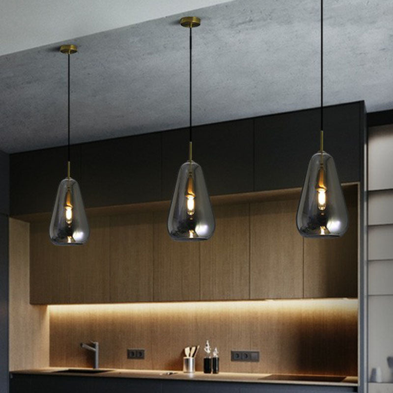 Droplet Open-Kitchen Pendant Light Glass 1 Head Simplicity Pendulum Light in Brass Clearhalo 'Ceiling Lights' 'Modern Pendants' 'Modern' 'Pendant Lights' 'Pendants' Lighting' 2255045