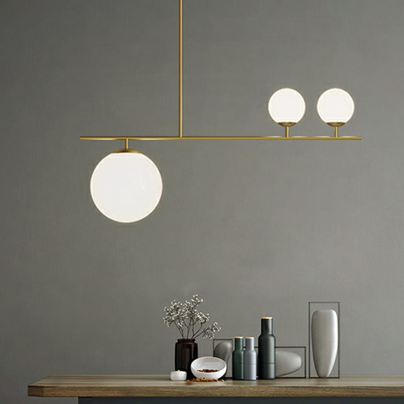 Simplicity Globe Hanging Lamp Opal Glass 3 Bulbs Dining Room Island Lighting in Gold Clearhalo 'Ceiling Lights' 'Island Lights' Lighting' 2255165