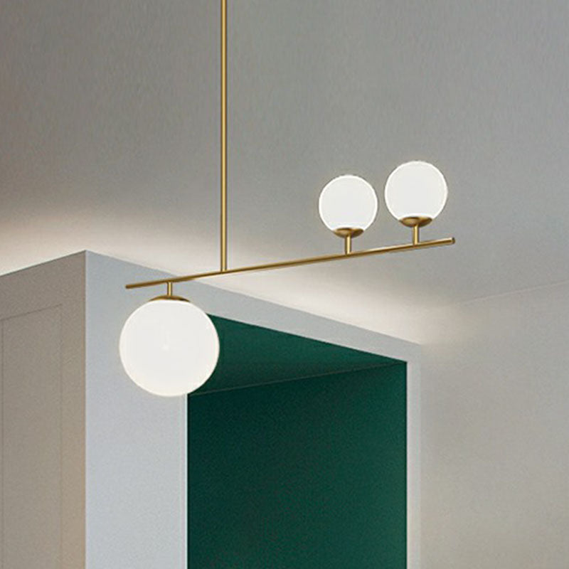 Simplicity Globe Hanging Lamp Opal Glass 3 Bulbs Dining Room Island Lighting in Gold Clearhalo 'Ceiling Lights' 'Island Lights' Lighting' 2255166