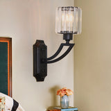 Cylindrical Clear Crystal Wall Light Modernist Style 1 Light Black/Gold Finish Wall Sconce Fixture with Curved Arm Black Clearhalo 'Cast Iron' 'Glass' 'Industrial' 'Modern wall lights' 'Modern' 'Tiffany' 'Traditional wall lights' 'Wall Lamps & Sconces' 'Wall Lights' Lighting' 225752