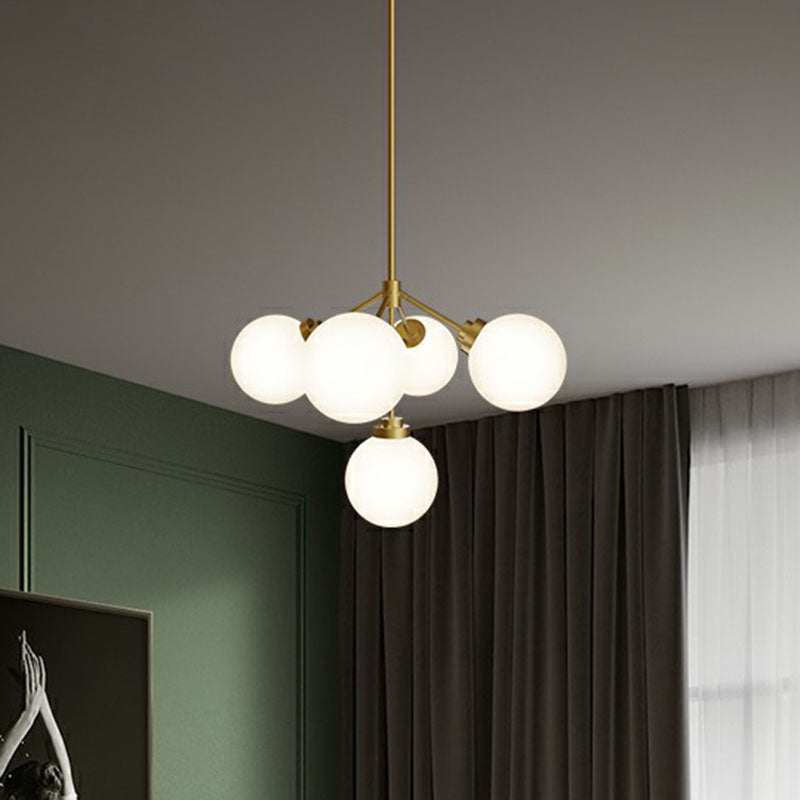 Ball Dining Room Chandelier Light Opal Glass 5-Bulb Minimalist Hanging Lamp in Gold Gold Clearhalo 'Ceiling Lights' 'Chandeliers' 'Modern Chandeliers' 'Modern' Lighting' 2266221