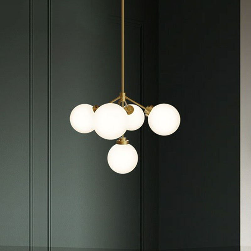 Ball Dining Room Chandelier Light Opal Glass 5-Bulb Minimalist Hanging Lamp in Gold Clearhalo 'Ceiling Lights' 'Chandeliers' 'Modern Chandeliers' 'Modern' Lighting' 2266222