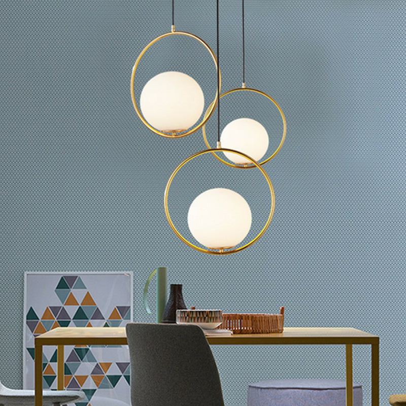 White Glass Spherical Hanging Lamp Post-Modern 1 Head Pendant Light with Metal Ring in Brass Clearhalo 'Ceiling Lights' 'Modern Pendants' 'Modern' 'Pendant Lights' 'Pendants' Lighting' 2283001