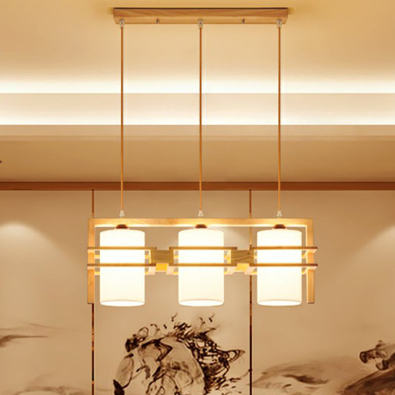 Wooden Linear Island Lighting Modern 3-Bulb Hanging Light with Cylindrical Fabric Shade Clearhalo 'Ceiling Lights' 'Island Lights' Lighting' 2293669