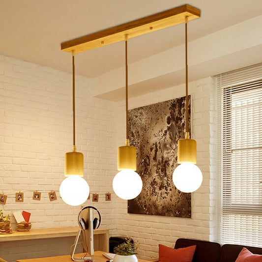 Wooden Bare Bulb Multiple Lamp Pendant Minimalist 3 Heads Beige Suspension Lighting Fixture Wood Linear Clearhalo 'Ceiling Lights' 'Modern Pendants' 'Modern' 'Pendant Lights' 'Pendants' Lighting' 2294439