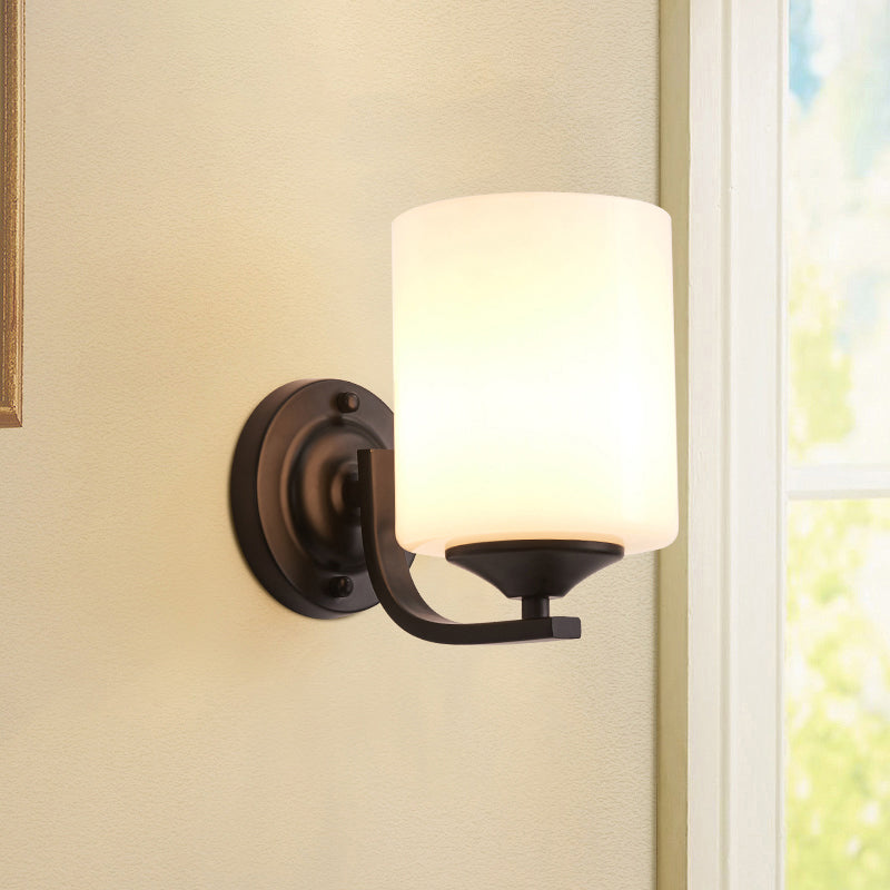 Single-Bulb Wall Sconce Simplicity Cylinder White Glass Wall Light Fixture in Black Clearhalo 'Wall Lamps & Sconces' 'Wall Lights' Lighting' 2311625