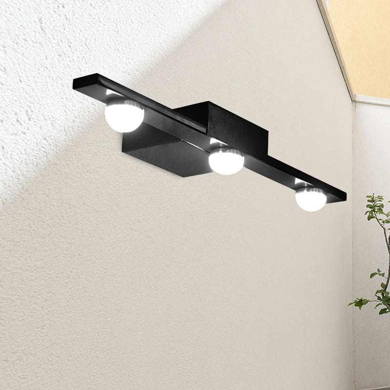 Black/White Linear Vanity Light Fixture Modern Style 3 Lights Metal Wall Lighting in Warm/White Light over Mirror Black Clearhalo 'Cast Iron' 'Glass' 'Industrial' 'Modern wall lights' 'Modern' 'Tiffany' 'Traditional wall lights' 'Vanity Lights' 'Wall Lights' Lighting' 234470