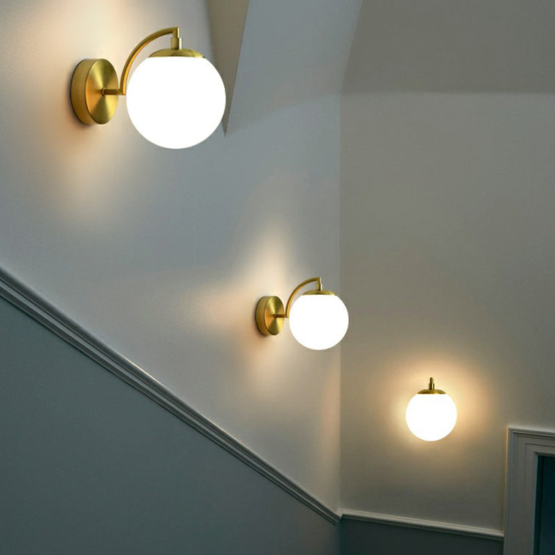Spherical Stairway Wall Lighting Fixture Glass 1 Bulb Simple Style Wall Mounted Light in Brass Clearhalo 'Cast Iron' 'Glass' 'Industrial' 'Modern wall lights' 'Modern' 'Tiffany' 'Traditional wall lights' 'Wall Lamps & Sconces' 'Wall Lights' Lighting' 2353436
