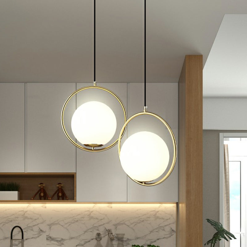 Globe Dining Room Suspension Lamp Milky Glass 1 Bulb Modern Pendant Light with Brass Loop White Clearhalo 'Ceiling Lights' 'Modern Pendants' 'Modern' 'Pendant Lights' 'Pendants' Lighting' 2353910