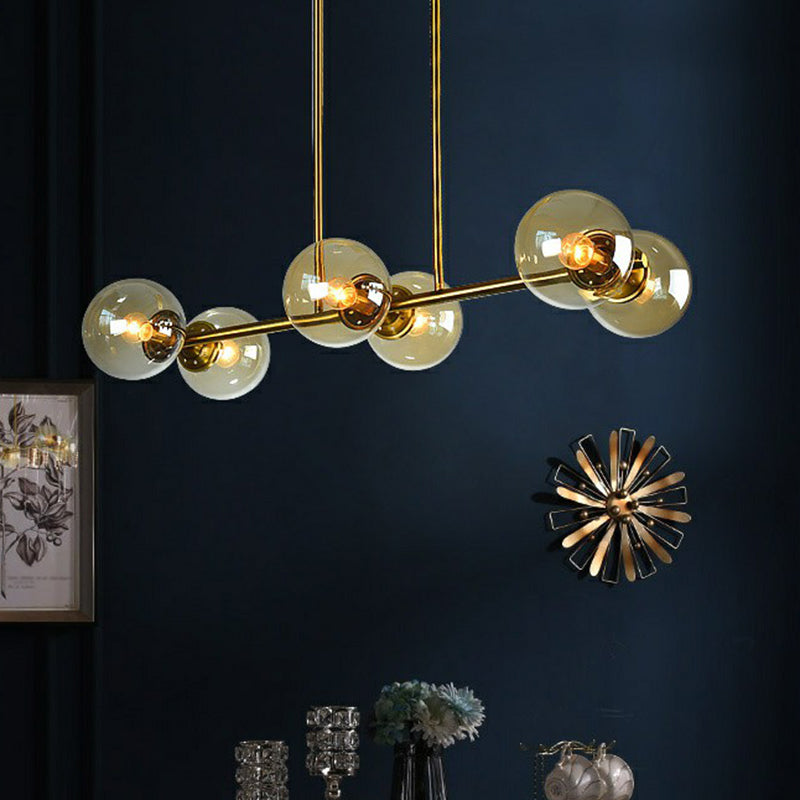 Brass Linear Island Light Fixture Postmodern Metal Ceiling Light with Globe Glass Shade Clearhalo 'Ceiling Lights' 'Island Lights' Lighting' 2354393