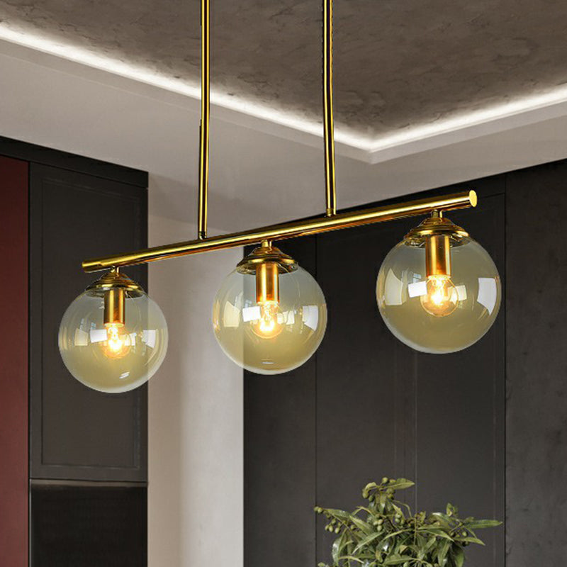 Brass Linear Island Light Fixture Postmodern Metal Ceiling Light with Globe Glass Shade Clearhalo 'Ceiling Lights' 'Island Lights' Lighting' 2354398