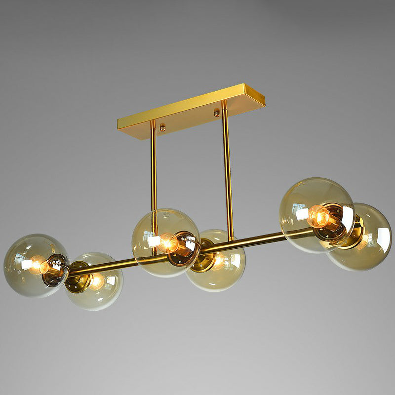 Brass Linear Island Light Fixture Postmodern Metal Ceiling Light with Globe Glass Shade 6 Amber Clearhalo 'Ceiling Lights' 'Island Lights' Lighting' 2354399