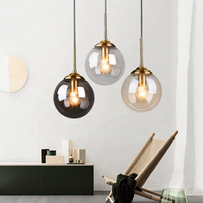 Postmodern Sphere Drop Pendant Blown Glass 1-Bulb Bedside Hanging Ceiling Light in Brass Clearhalo 'Ceiling Lights' 'Glass shade' 'Glass' 'Modern Pendants' 'Modern' 'Pendant Lights' 'Pendants' Lighting' 2356933