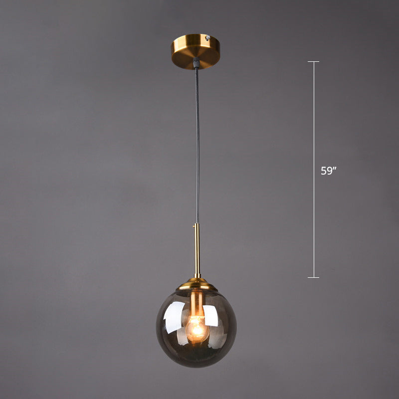 Postmodern Sphere Drop Pendant Blown Glass 1-Bulb Bedside Hanging Ceiling Light in Brass Smoke Gray Clearhalo 'Ceiling Lights' 'Glass shade' 'Glass' 'Modern Pendants' 'Modern' 'Pendant Lights' 'Pendants' Lighting' 2356934