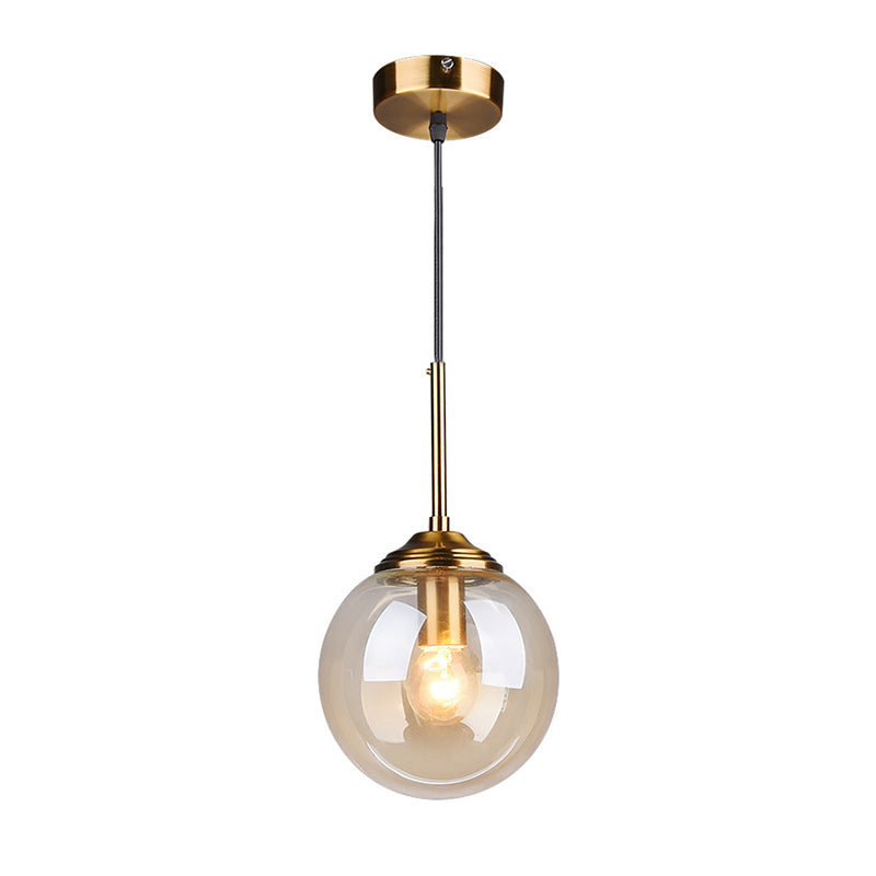 Postmodern Sphere Drop Pendant Blown Glass 1-Bulb Bedside Hanging Ceiling Light in Brass Clearhalo 'Ceiling Lights' 'Glass shade' 'Glass' 'Modern Pendants' 'Modern' 'Pendant Lights' 'Pendants' Lighting' 2356937