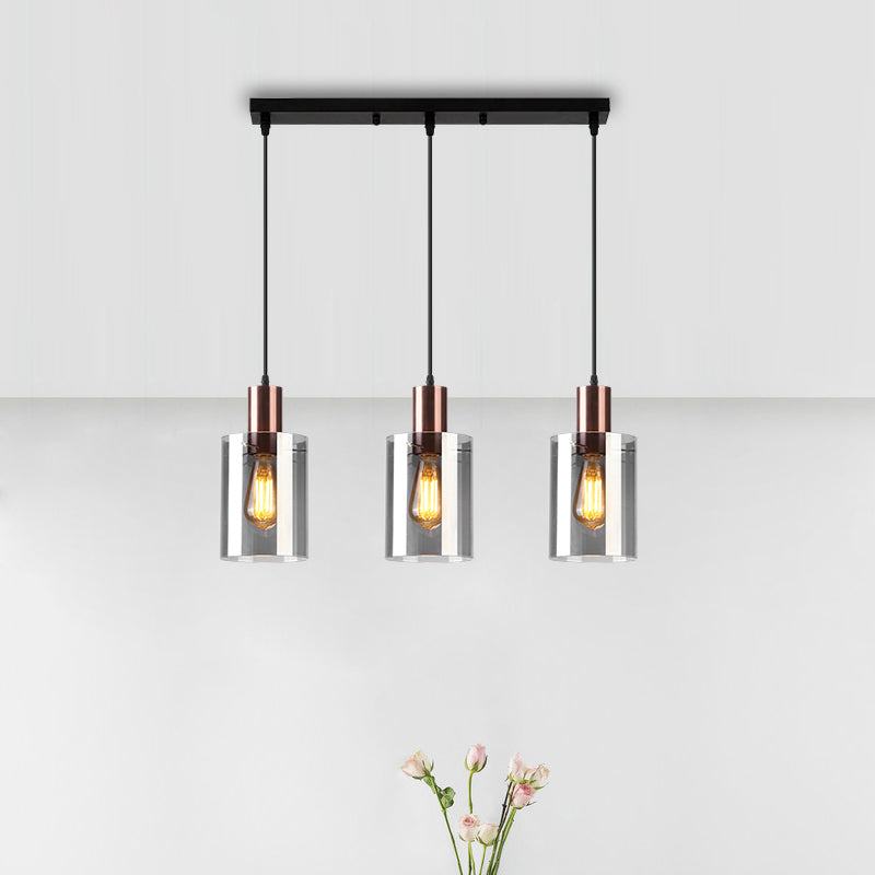 Rose Gold Bottle Cluster Pendant Modernist 3-Bulb Smoke Glass Hanging Light for Restaurant Clearhalo 'Ceiling Lights' 'Chandeliers' 'Glass shade' 'Glass' 'Modern Pendants' 'Modern' 'Pendant Lights' 'Pendants' Lighting' 2357056