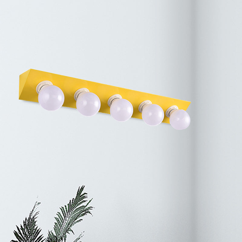 Metal Linear Vanity Sconce Light with Bare Bulb Macaron Style 5 Lights Wall Sconce in Pink/Yellow Yellow Clearhalo 'Cast Iron' 'Glass' 'Industrial' 'Modern wall lights' 'Modern' 'Tiffany' 'Traditional wall lights' 'Vanity Lights' 'Wall Lights' Lighting' 236098