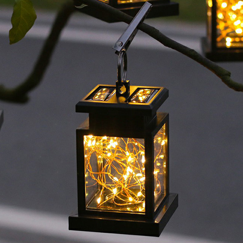 Clear Glass Lantern Pendant Light Artistic Black LED Solar Hanging Light with Clamp and Hook Clearhalo 'Ceiling Lights' 'Pendant Lights' 'Pendants' Lighting' 2364412