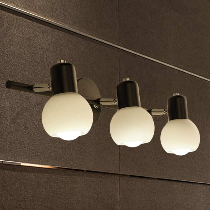 Globe Living Room Vanity Sconce Light Metal and Milk Glass 2/3 Lights Contemporary Wall Light Fixture in Black 3.0 Black Clearhalo 'Cast Iron' 'Glass' 'Industrial' 'Modern wall lights' 'Modern' 'Tiffany' 'Traditional wall lights' 'Vanity Lights' 'Wall Lights' Lighting' 236572