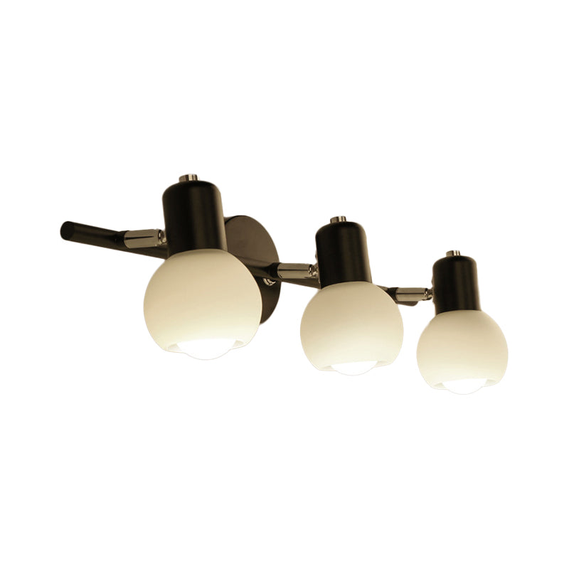 Globe Living Room Vanity Sconce Light Metal and Milk Glass 2/3 Lights Contemporary Wall Light Fixture in Black Clearhalo 'Cast Iron' 'Glass' 'Industrial' 'Modern wall lights' 'Modern' 'Tiffany' 'Traditional wall lights' 'Vanity Lights' 'Wall Lights' Lighting' 236574