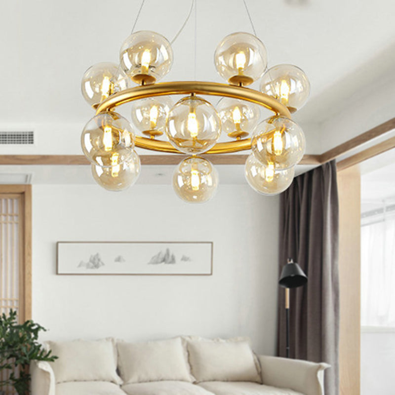 Post Modern Style 12 Bulbs Chandelier Gold Globe Suspension Light with Clear Glass Shade Clearhalo 'Ceiling Lights' 'Chandeliers' 'Glass shade' 'Glass' 'Modern Chandeliers' 'Modern' Lighting' 239313