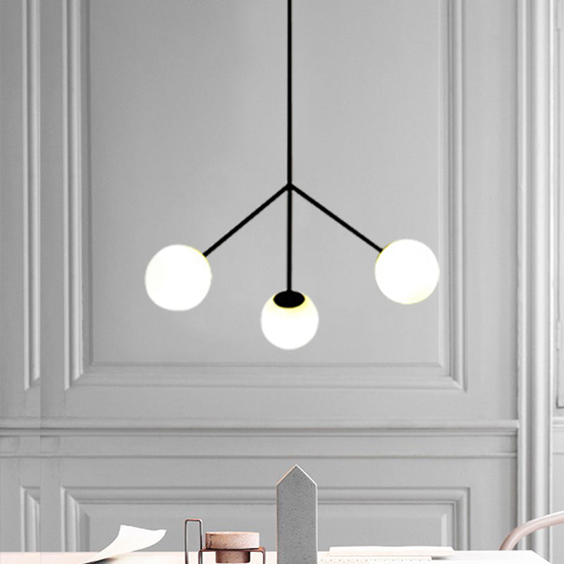 Simple Style 3 Heads Chandelier Lighting with Glass Shade Black Finish Globe Hanging Lamp for Dining Room Clearhalo 'Ceiling Lights' 'Chandeliers' 'Modern Chandeliers' 'Modern' Lighting' 239906