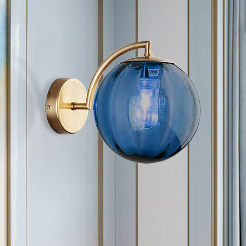 Postmodernist Brass Armed Ball Sconce Lamp Red/Blue/Amber Glass Single Light Wall Lighting Fixture Blue Clearhalo 'Cast Iron' 'Glass' 'Industrial' 'Modern wall lights' 'Modern' 'Tiffany' 'Traditional wall lights' 'Wall Lamps & Sconces' 'Wall Lights' Lighting' 240182