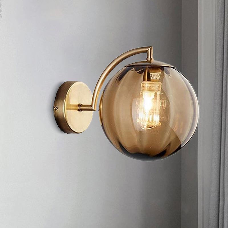 Postmodernist Brass Armed Ball Sconce Lamp Red/Blue/Amber Glass Single Light Wall Lighting Fixture Amber Clearhalo 'Cast Iron' 'Glass' 'Industrial' 'Modern wall lights' 'Modern' 'Tiffany' 'Traditional wall lights' 'Wall Lamps & Sconces' 'Wall Lights' Lighting' 240184
