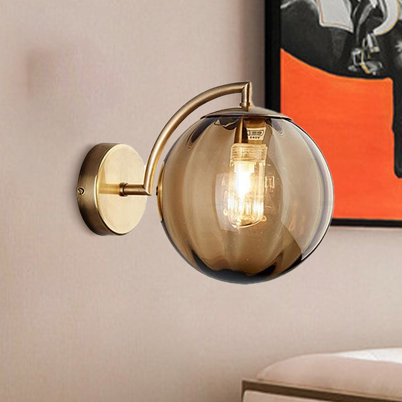 Postmodernist Brass Armed Ball Sconce Lamp Red/Blue/Amber Glass Single Light Wall Lighting Fixture Clearhalo 'Cast Iron' 'Glass' 'Industrial' 'Modern wall lights' 'Modern' 'Tiffany' 'Traditional wall lights' 'Wall Lamps & Sconces' 'Wall Lights' Lighting' 240185