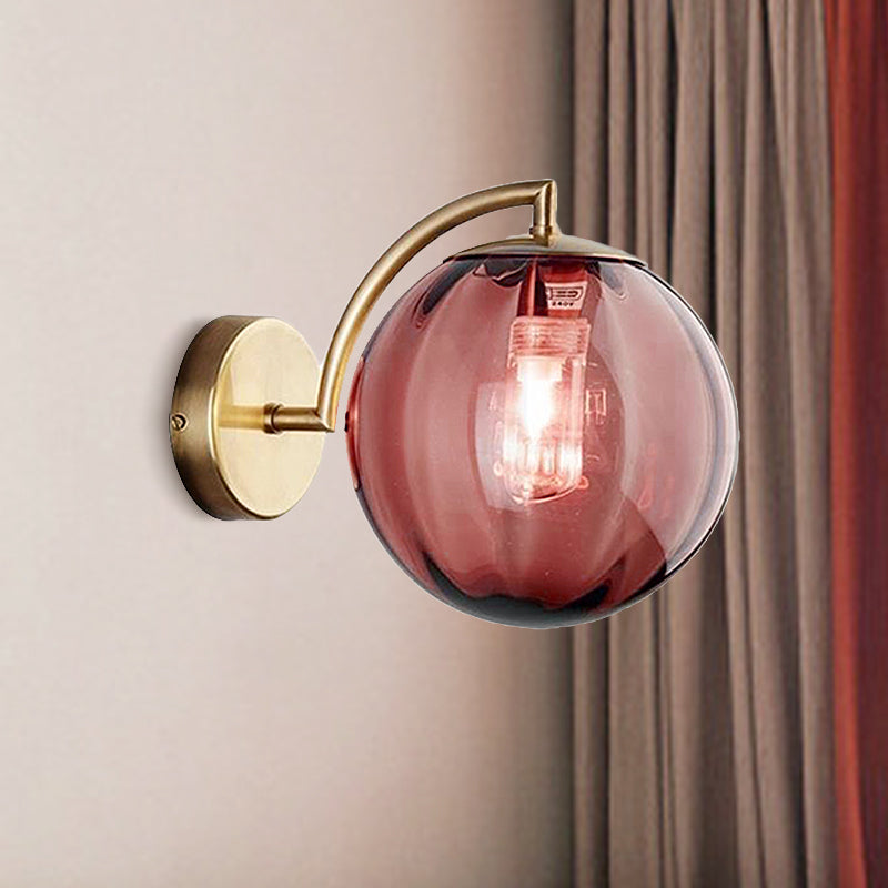 Postmodernist Brass Armed Ball Sconce Lamp Red/Blue/Amber Glass Single Light Wall Lighting Fixture Red Clearhalo 'Cast Iron' 'Glass' 'Industrial' 'Modern wall lights' 'Modern' 'Tiffany' 'Traditional wall lights' 'Wall Lamps & Sconces' 'Wall Lights' Lighting' 240186