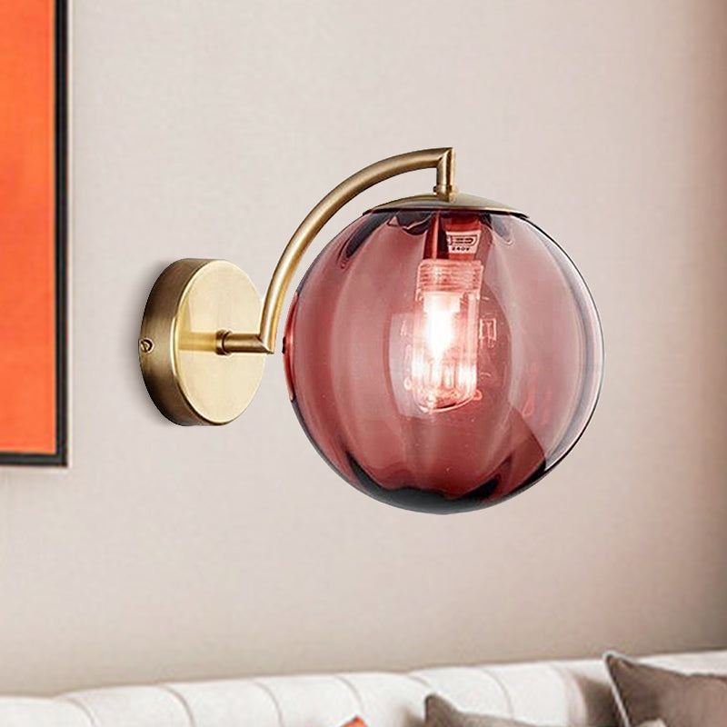 Postmodernist Brass Armed Ball Sconce Lamp Red/Blue/Amber Glass Single Light Wall Lighting Fixture Clearhalo 'Cast Iron' 'Glass' 'Industrial' 'Modern wall lights' 'Modern' 'Tiffany' 'Traditional wall lights' 'Wall Lamps & Sconces' 'Wall Lights' Lighting' 240187