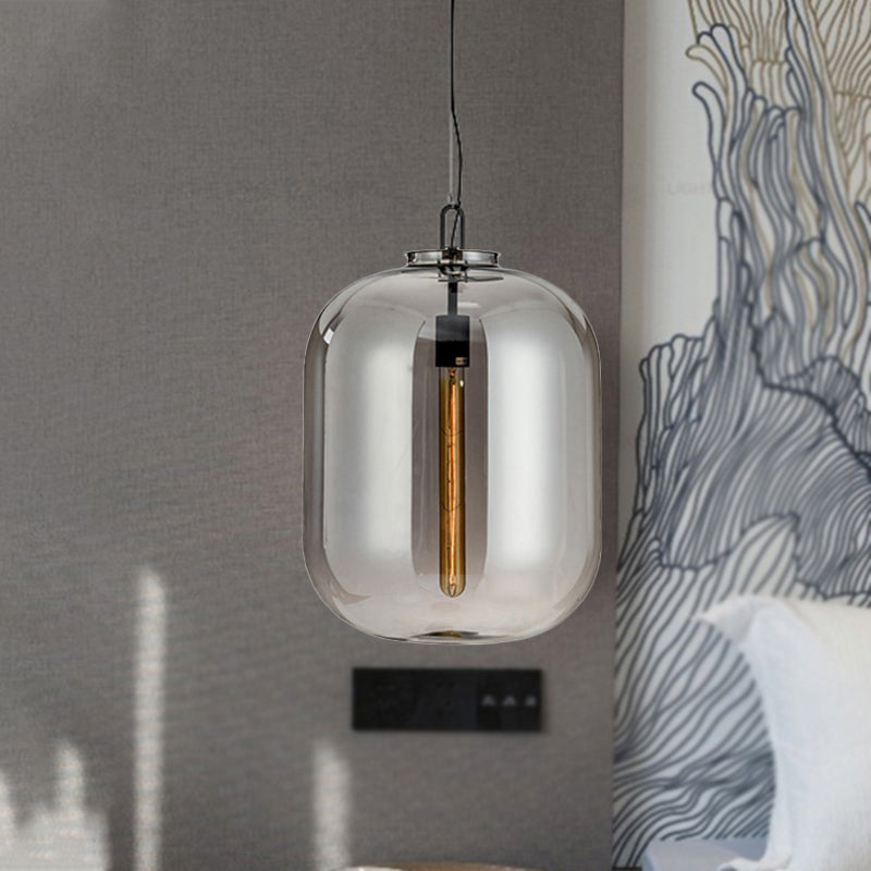 Modernist 1 Light Hanging Light Fixture with Glass Shade Amber/Smoke Gray Oval Pendant Lighting for Bedroom, 10"/14" W Smoke Gray Clearhalo 'Ceiling Lights' 'Glass shade' 'Glass' 'Modern Pendants' 'Modern' 'Pendant Lights' 'Pendants' Lighting' 240406