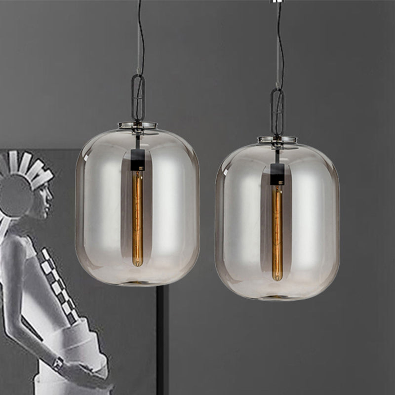 Modernist 1 Light Hanging Light Fixture with Glass Shade Amber/Smoke Gray Oval Pendant Lighting for Bedroom, 10"/14" W Clearhalo 'Ceiling Lights' 'Glass shade' 'Glass' 'Modern Pendants' 'Modern' 'Pendant Lights' 'Pendants' Lighting' 240407