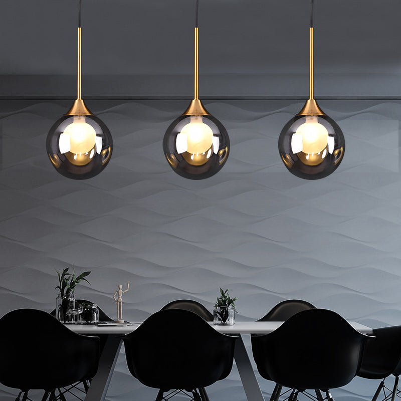 Ball Down Lighting Pendant Minimalism Glass 3-Head Dining Room Multiple Hanging Light Clearhalo 'Ceiling Lights' 'Modern Pendants' 'Modern' 'Pendant Lights' 'Pendants' Lighting' 2408793