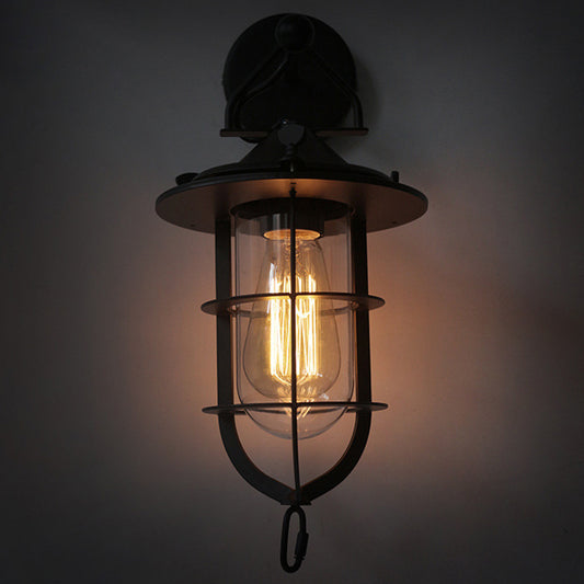 Black Single Wall Light Fixture Industrial Metal Wire Cage Wall Sconce with Clear Glass Shade Clearhalo 'Art deco wall lights' 'Cast Iron' 'Glass' 'Industrial wall lights' 'Industrial' 'Middle century wall lights' 'Modern' 'Rustic wall lights' 'Tiffany' 'Traditional wall lights' 'Wall Lamps & Sconces' 'Wall Lights' Lighting' 2415676