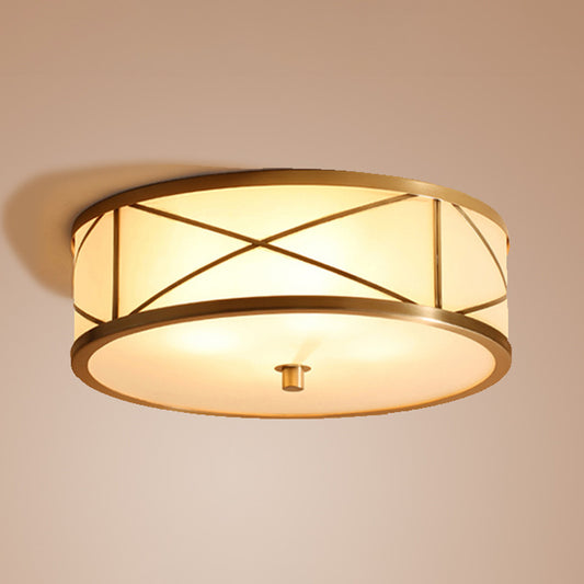 Simplicity Drum Flushmount Lighting Opal Glass Ceiling Mounted Fixture with X Brace in Brass Clearhalo 'Ceiling Lights' 'Close To Ceiling Lights' 'Close to ceiling' 'Flush mount' Lighting' 2415796