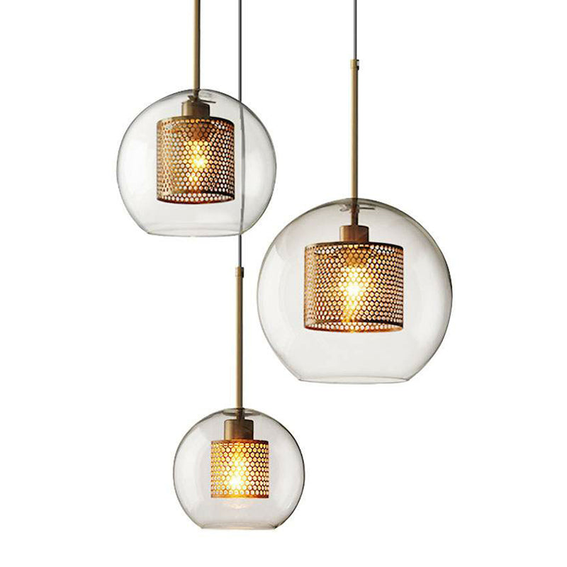 Geometric Clear Glass Ceiling Pendant Postmodern 1 Bulb Brass Finish Hanging Light with Mesh Inside Clear Globe Clearhalo 'Ceiling Lights' 'Chandeliers' 'Glass shade' 'Glass' 'Modern Pendants' 'Modern' 'Pendant Lights' 'Pendants' Lighting' 2423066