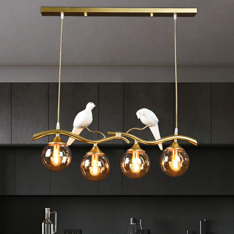 Minimalist Branch Island Lighting Metal 4-Light Dining Room Pendant Light with Ball Glass Shade and Bird Deco Gold Amber Clearhalo 'Ceiling Lights' 'Island Lights' Lighting' 2423076