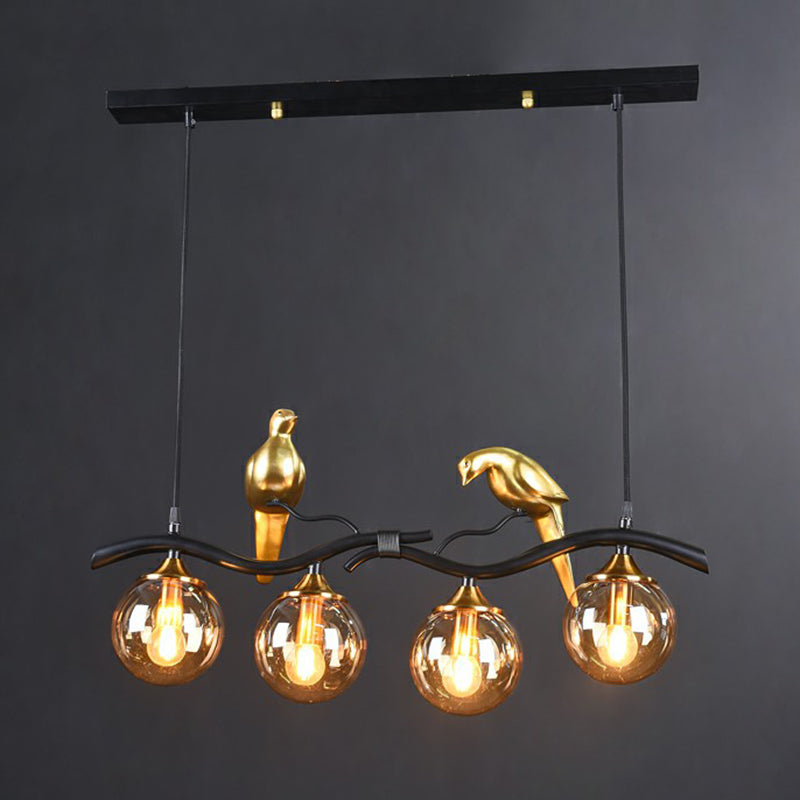 Minimalist Branch Island Lighting Metal 4-Light Dining Room Pendant Light with Ball Glass Shade and Bird Deco Black Amber Clearhalo 'Ceiling Lights' 'Island Lights' Lighting' 2423077