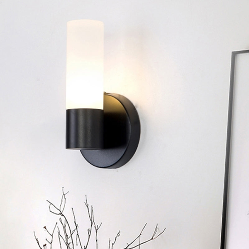 Cylinder White Glass Sconce Lamp Modernist 1 Light Black Led Wall Mounted Light Fixture Clearhalo 'Cast Iron' 'Glass' 'Industrial' 'Modern wall lights' 'Modern' 'Tiffany' 'Traditional wall lights' 'Wall Lamps & Sconces' 'Wall Lights' Lighting' 242509