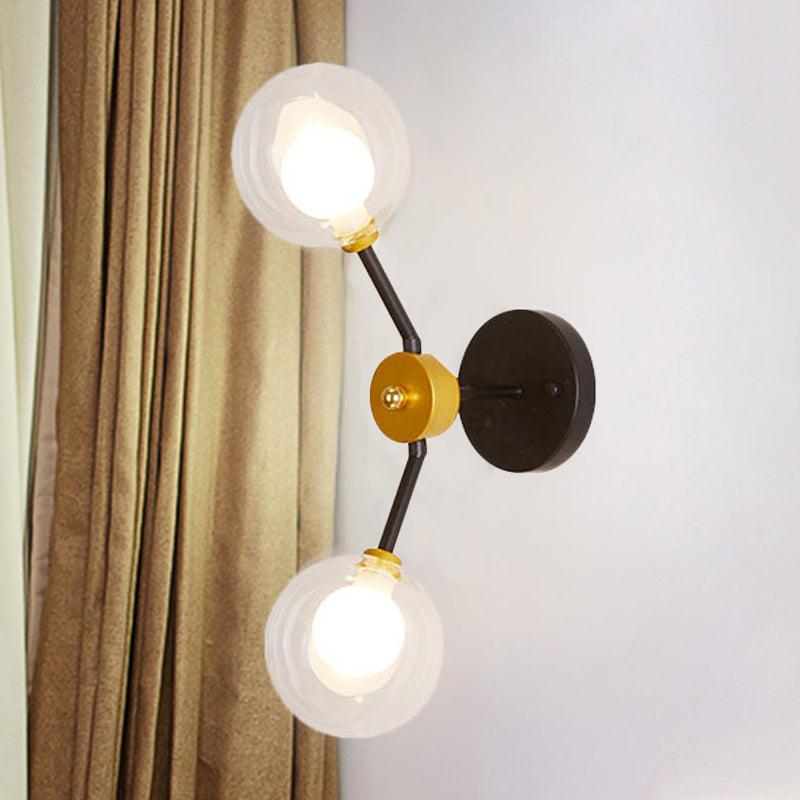 2 Lights Bedroom Sconce Light with Global Clear Glass Shade Modern Black Led Wall Mount Light Black Clearhalo 'Cast Iron' 'Glass' 'Industrial' 'Modern wall lights' 'Modern' 'Tiffany' 'Traditional wall lights' 'Wall Lamps & Sconces' 'Wall Lights' Lighting' 242979