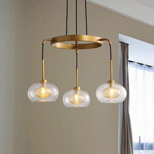 Gold Oval Chandelier Lighting Post-Modern 3 Lights Clear Glass Led Pendant Light Fixture with Ring Design Gold Clearhalo 'Ceiling Lights' 'Chandeliers' 'Glass shade' 'Glass' 'Modern Chandeliers' 'Modern' Lighting' 243811