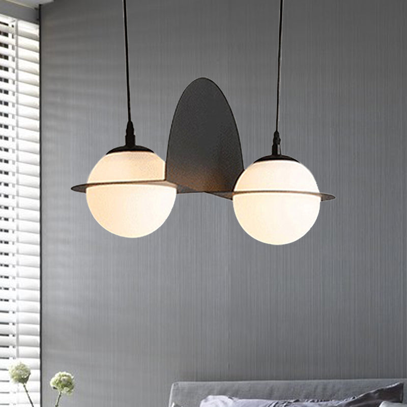 Ball White Glass Cluster Pendant with Straight/Curved Design Modernist 2/3 Lights Black Led Hanging Lamp 2 Black Straight Clearhalo 'Ceiling Lights' 'Glass shade' 'Glass' 'Modern Pendants' 'Modern' 'Pendant Lights' 'Pendants' Lighting' 244468